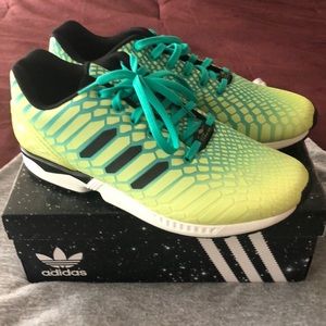 adidas torsion glow in the dark running shoes.